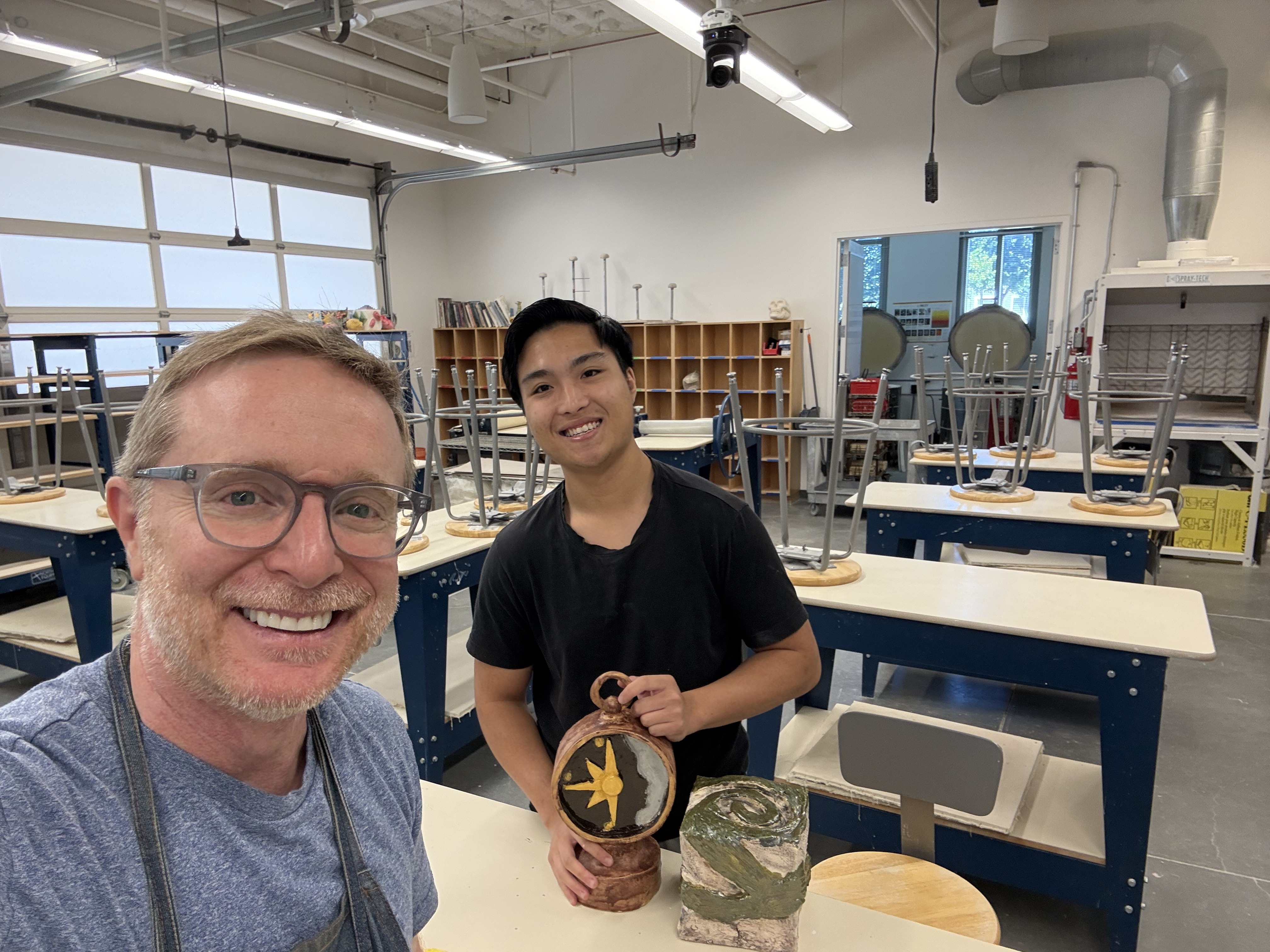 Ray with Professor Pancho Jimenez in the ceramics studio